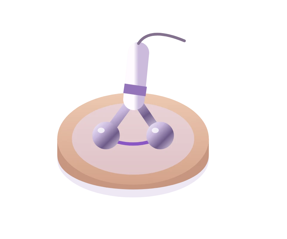 Illustration of a twin-sphere microcurrent probe resting on a small gel-covered patch of skin.